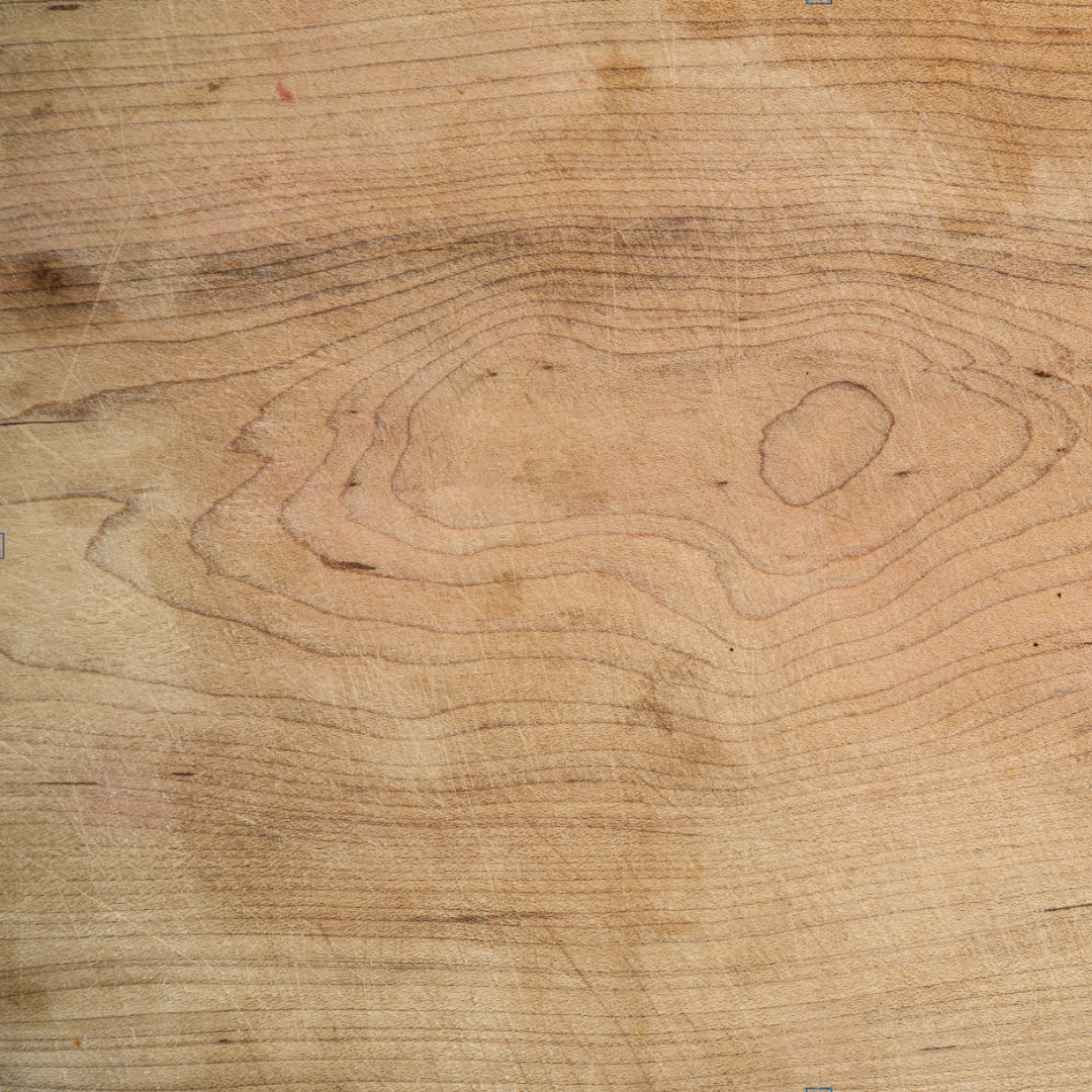 Close-up of a wooden surface with visible grain and texture